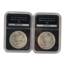 TWO 19TH CENTURY AMERICAN SILVER UNCIRCULATED MORGAN DOLLAR COINS, DATED 1886 and 1889 In PCS stamps