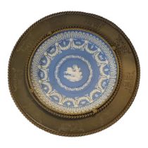 A 19TH CENTURY GILDED BRONZE TAZZA Centrally set with Wedgwood Jasperware blue and white