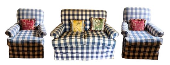 A PAIR OF CLUB ARMCHAIRS With over scroll arms, in a blue and cream check fabric, along with