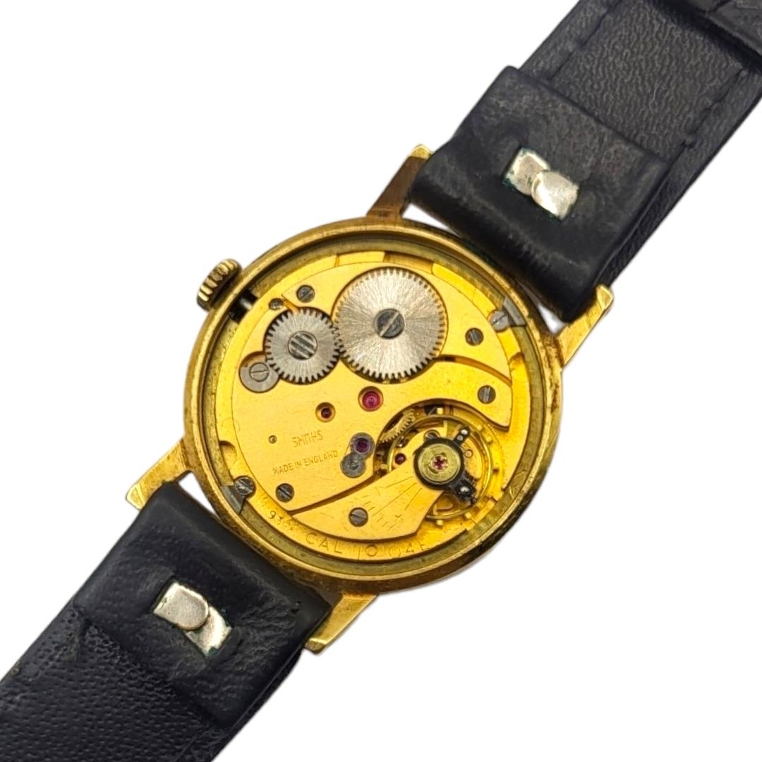 SMITHS, EVEREST, A 1950’S YELLOW METAL CASED GENT’S SLIM WRISTWATCH Having a gold tone dial, - Image 5 of 5