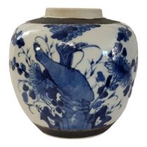 A 19TH CENTURY CHINESE BLUE AND WHITE PORCELAIN GINGER JAR Having faux bronze bands and hand painted