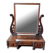 A KING WILLIAM IV MAHOGANY DRESSING TABLE MIRROR Having a tilt mirror with carved supports and two