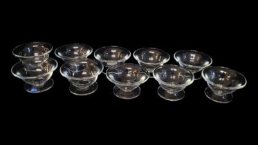 WILLIAM YEOWARD,A SET OF TEN LEAD CRYSTAL DESSERT BOWLS Plain form with flared rim and etched mark