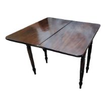 A VICTORIAN SOLID CUBAN MAHOGANY FOLD OVER TEA/DINING TABLE On turned legs, seats four. (81cm x 42cm