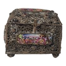 A CONTINENTAL WHITE METAL AND ENAMEL FILIGREE RECTANGULAR TRINKET BOX With figural enamel panels and