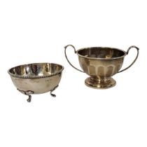 A VINTAGE INDIAN SILVER SUGAR BASIN Plain form, with beaded edge and tripod legs, together with a