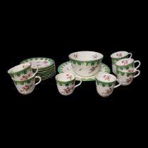 A 19TH CENTURY ENGLISH PORCELAIN TEA SET Comprising eight cups and saucers, slip basin and bread