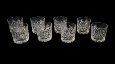 A SET OF EIGHT 20TH CENTURY CUT LEAD CRYSTAL WHISKEY GLASSES/TUMBLERS Each having cut star form