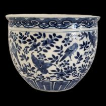 A CHINESE BLUE AND WHITE PORCELAIN JARDINIÈRE Hand painted decoration of flowers and birds,