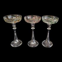 FRITZ HECKERT, A SET OF THREE ART NOUVEAU GLASS CHAMPAGNE FLUTES Decorated with berries, one pink