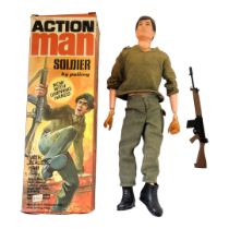 ACTION MAN, A VINTAGE SOLDIER FIGURE Wearing green beret, khaki uniform and rifle, in original