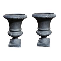A PAIR OF CAST IRON NEOCLASSICAL URNS Campagna form with square base. (approx 30cm) Condition: good