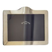 DEREK BURRIDGE OF LONDON, A HALLMARKED SILVER FAMILY PHOTOGRAPH FRAME OF PLAIN DESIGN Stamped on