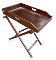 A GEORGE III MAHOGANY BUTLER’S TRAY ON STAND. (h 76.5cm x d 45cm x 70.5cm)
