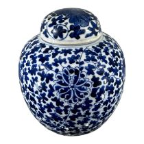 A CHINESE KANGXI BLUE AND WHITE LOTUS GINGER JAR Decorated with underglaze blue with large lotus