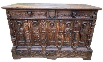 A 16TH CENTURY FRENCH, OAK COFFER with hinged lid above carved freeze decorated with swags and