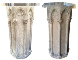 A PAIR OF 16TH CENTURY OCTAGONAL CARVED LIMESTONE COLUMNS Each with eight Gothic-arched niches,