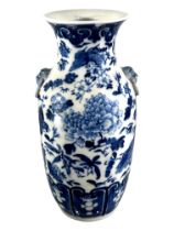 A CHINESE BLUE AND WHITE VASE, BEARING KANGXI MARK TO UNDERSIDE Decorated with birds, butterflies