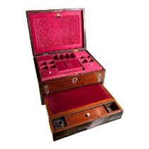 A VICTORIAN ROSEWOOD SEWING AND WRITING BOX Having Mother of pearl inlay and pink satin lined