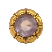 A VINTAGE 14CT YELLOW GOLD AND AMETHYST RING The central round cut amethyst (approx diameter 12mm)