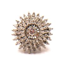 A VINTAGE 18CT WHITE GOLD AND DIAMOND CLUSTER RING Three tiered round cut diamond halo (approx