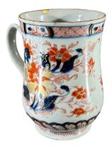 A LARGE 18TH CENTURY CHINESE IMARI BELL FORM PORCELAIN TANKARD Decorated with blossoming peonies