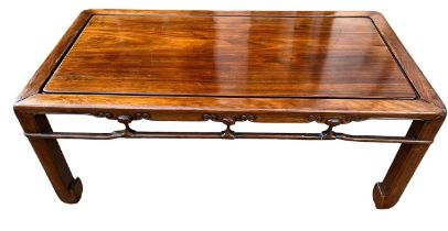 AN 18TH/19TH CENTURY CHINESE HUANGHUALI LOW TABLE The single rectangular inserted panel top above