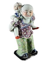 LARGE CHINESE LATE QING DYNASTY PORCELAIN FIGURAL GROUP OF TWO BROTHERS Standing position with
