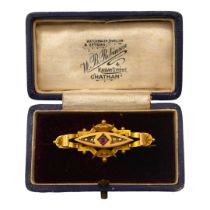 AN EDWARDIAN 9CT GOLD, AMETHYST AND SEED PEARL BROOCH, HOUSED IN ASSOCIATED CASE Having applied rope
