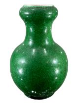A 19TH CENTURY CHINESE QING DYNASTY, APPLE-GREEN GLAZED, GARLIC BULB MOUTH SHAPED VASE Rich green
