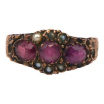 A VICTORIAN 9CT ROSE GOLD, AMETHYST AND SEED PEARL RING The central round cut amethyst (approx