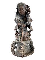 A LARGE CHINESE LATE QING DYNASTY CARVED SOAPSTONE FIGURE OF LI TIEGUAI, ONE OF THE EIGHT IMMORTALS.