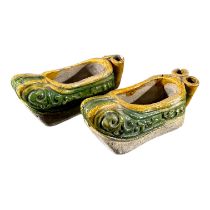 PAIR OF 19TH CENTURY CHINESE QING DYNASTY SANCAI GLAZED SHOES Earthen greens and browns. (h 4.5cm