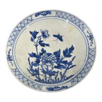 A 19TH CENTURY CHINESE QING DYNASTY BLUE AND WHITE PORCELAIN CHARGER Decorated with butterfly