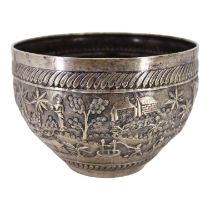 PROBABLY CALCUTTA, INDIA. LATE 19TH/EARLY 20TH CENTURY INDIAN SILVER BOWL. Decorated with village