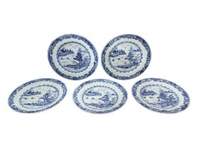FIVE 18TH CENTURY CHINESE EXPORT BLUE AND WHITE PLATES All decorated with landscape scene, showing