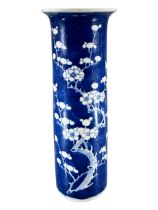 A 19TH CENTURY CHINESE QING DYNASTY BLUE AND WHITE TRUMPET VASE Decorated with prunus blossom on