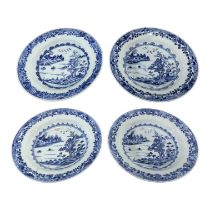 FOUR 18TH CENTURY CHINESE EXPORT BLUE AND WHITE BOWLS All decorated with landscape scene showing