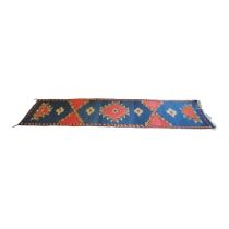 A LATE 20TH CENTURY TURKMEN TRIBAL TYPE LONG WOODEN RUNNER Decorated with strong geometric