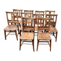 A MATCHED SET OF TEN LATE 19TH CENTURY OAK AND ELM CHURCH CHAIRS Two with pierced clover leaf back