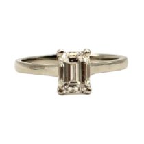 A PLATINUM AND NATURAL 1 CARAT EMERALD CUT DIAMOND SOLITAIRE RING Complete with GCS certificate