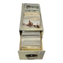 A TABLETOP FILING CABINET Containing approximately 400 early 20th Century later postcards, ships,