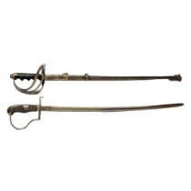 AN EARLY 20TH CENTURY ITALIAN CAVALRY SWORD Having a carved wooden handle, engraved decoration to
