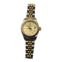 ROLEX, DATEJUST, A VINTAGE 18CT GOLD AND STAINLESS STEEL LADIES’ WRISTWATCH Gold tone textured dial,