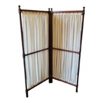 A VICTORIAN MAHOGANY TWO FOLD DRESSING SCREEN With ring turned columns. (124cm x 57cm) Condition: