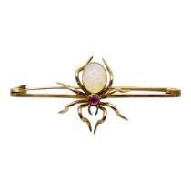 AN EARLY 20TH CENTURY OPAL AND RUBY INSECT BROOCH A spider set with cabochon cut opal with round cut