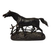 A 20TH CENTURY RUSSIAN CAST IRON EQUESTRIAN FIGURE The single horse in standing pose with trellis