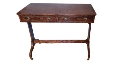 A GEORGIAN STYLE BURR WALNUT SIDE TABLE With two real and two false drawers, raised on columns