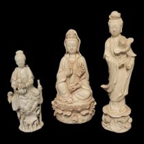 A COLLECTION OF THREE EARLY 20TH CENTURY CHINESE BLANC DE CHINE FIGURES OF GUANYIN Standing pose