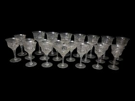 A LATE EDWARDIAN FINE COLLECTION OF TWENTY-THREE FACTORY WINE AND SHERRY GLASSWARE All with facet
